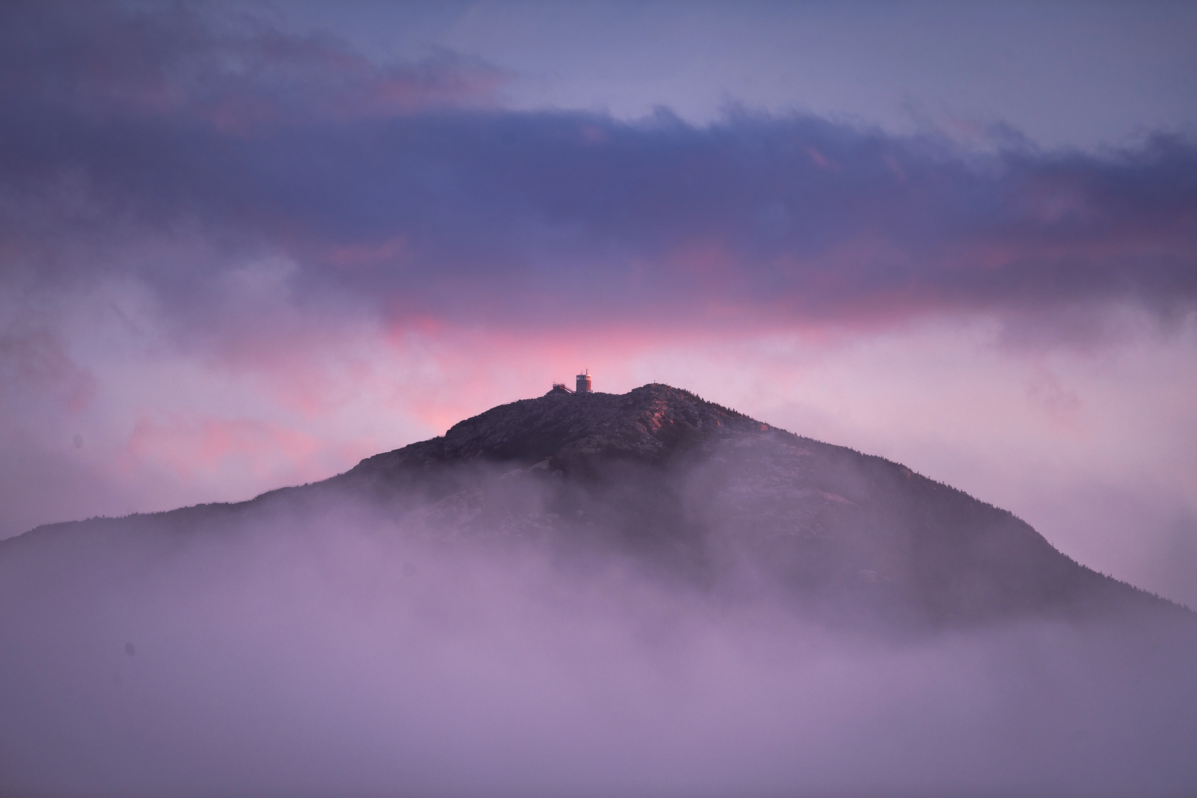 From Connery Pond, Whiteface rises through a soft sea of fog. Connery Pond, Whiteface Mountain region, Adirondacks, New York.